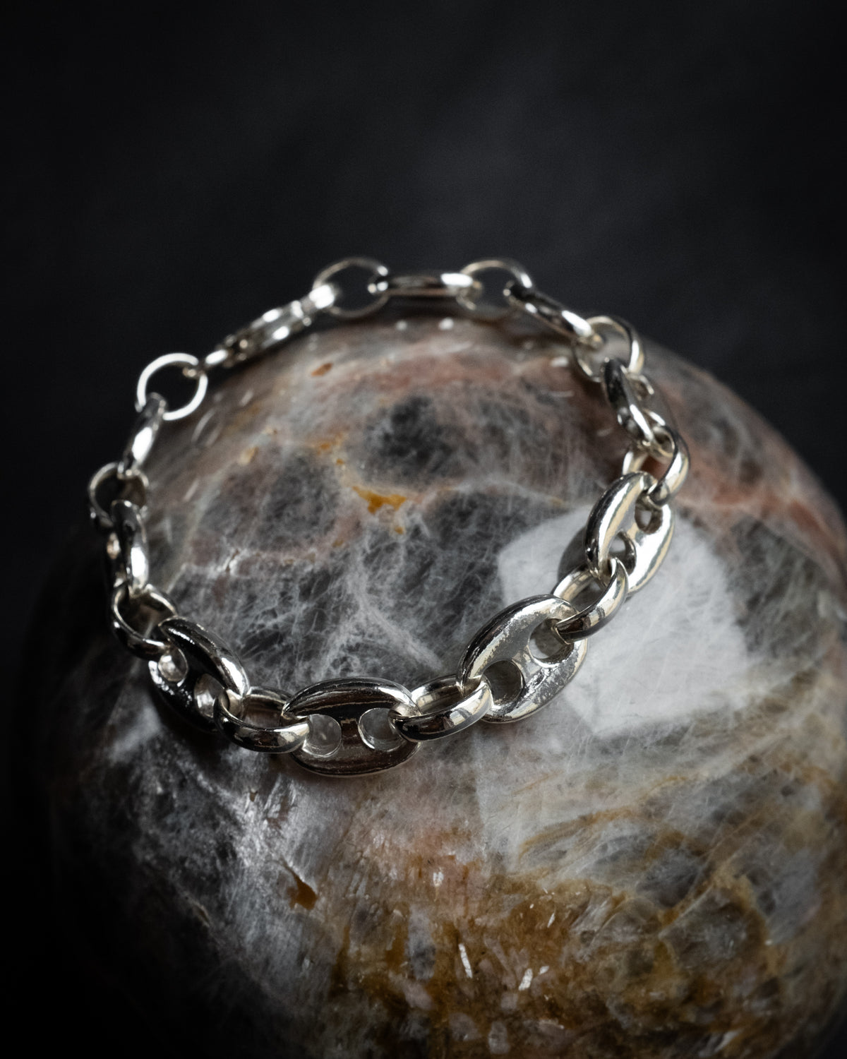 Heavy sterling silver marine chain bracelet on a polished stone sphere